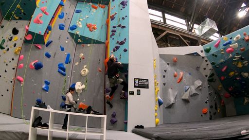 Climb 1 - Purple 5.9 (F): This somewhat interesting route on the extreme right side of Groto Right wall featured one sharp but shallow overhang near the bottom, then a mostly straightforward climb to the top on jugs, volumes, and grooved pinches.  Not wanting to expend too much energy on this "warm-up" route I climbed and down-climbed only once.