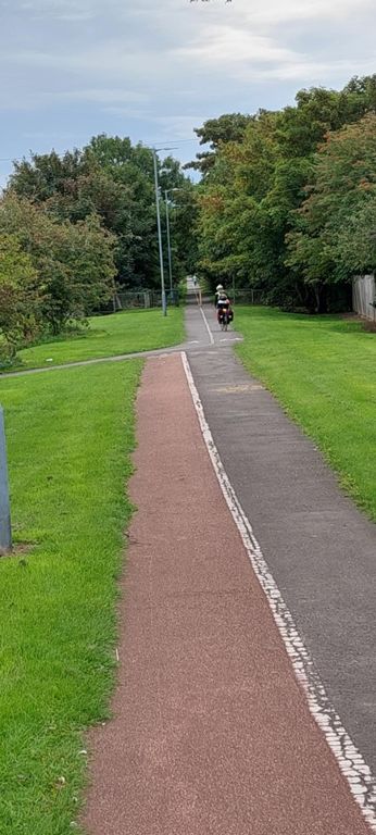 Photo taken 6 mins/0.76 mile after the bridge.  Rather than follow Route 1 with repeated swathes of broken glass in the Stockton-on-Tees council area which stretched almost to Middleton-on-Leven on our route, we should have continued on this path (looks fine in Google Maps' Streetview), till its end by the Stockton-Darlington Railway 1821/25 boundary stone on Darlington Road.    We could have continued further south straight over that road, using the Stockton South Greenway to Eaglescliffe, 5.24 miles from Maltby on the original route, bypassing Middlesbrough removing 12.6 miles.