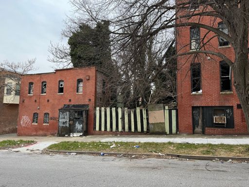 That little house on the left would be great fixed up.