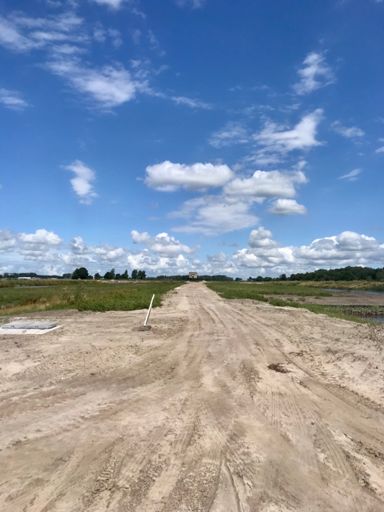 Ik sta hier op 500m met zicht op start. In de verte zie je de oude starttoren nog. De baan is hier dus vol geplempt met zand.