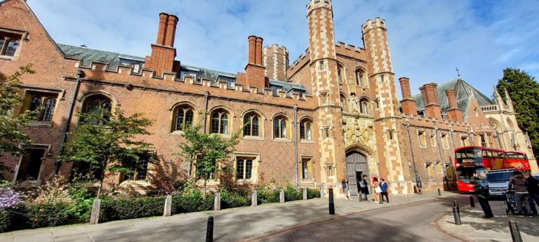 St John's College, University of Cambridge. Its entrance with the towers is grade I listed and early 16th century, relocated here in 1855  https://historicengland.org.uk/listing/the-list/list-entry/1332179