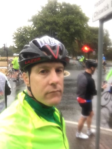 Looking miserable and already drenched at 18 miles (Chiswick Bridge)
