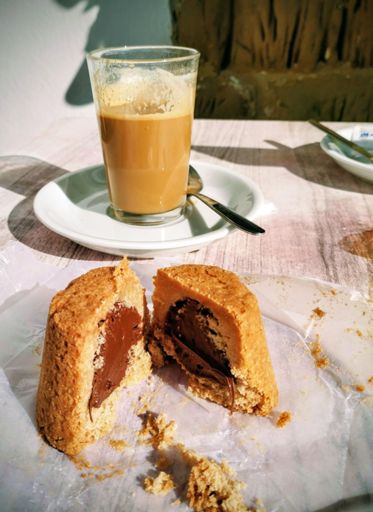 Café con leche y cubilete de chocolate en Grazalema 