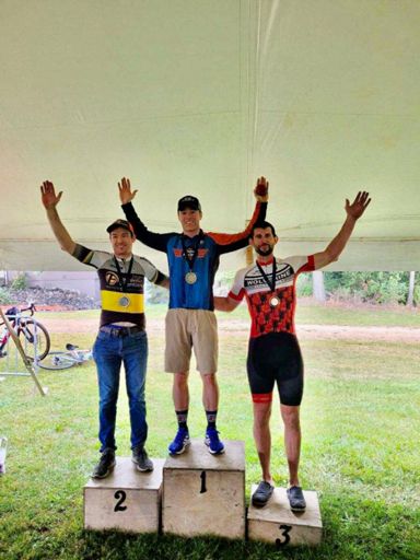 Daniel Yankus should be on 2nd step, but he ain’t got time to stick around for age group podiums so he split and Collin Snyder filled in.