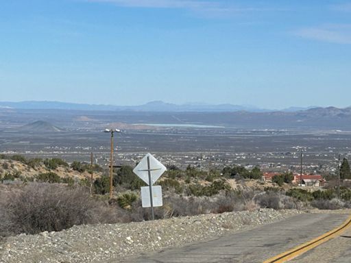 That lake in the distance is El Mirage. It is usually a dry lake that they race cars and motorcycles on. There’s a couple feet of standing water out there now.