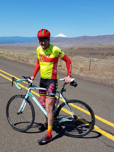Kent at the top of climb #3... Mt Hood in the background...