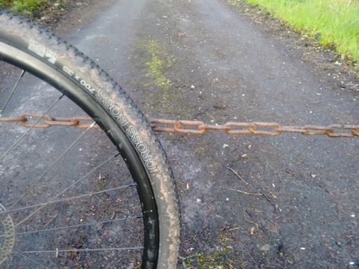 Almost came a cropper at this chain across the road!.  Must look up