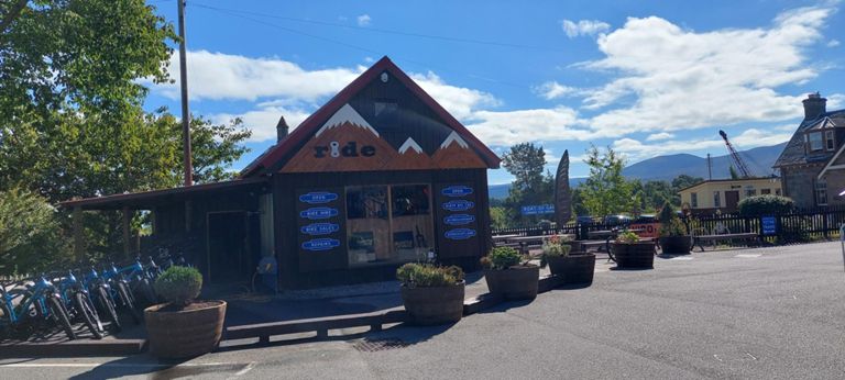 Ride Scotland cycle shop by Boat of Garten railway station. I was concerned my rear tyre in particular was low. They were all about right! Lorraine's front, which has a leak filled with gunge near the valve was at 60 and oozed more gunge as the tyre was filled by one of their helpful  and enthusiastic staff.