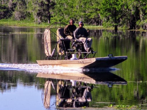 Two hunters coming in on their airboat.