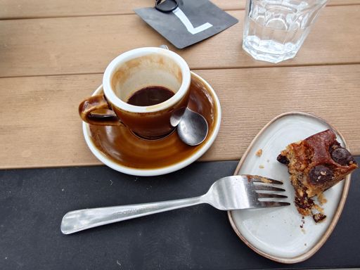 the simple joy of forgetting to take a photo of the main course. got in after the kitchen was closed so it was pretty mid, but the coffee was nice at least.