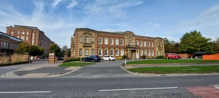 Main building: Formerly Terry's of York HQ (1927-2005), now Chocolate Works care village.  https://en.wikipedia.org/wiki/The_Chocolate_Works & https://www.springfieldhealthcare.com/care-homes/care-villages/chocolate-works/  To the left: former 1930 Terry's Rowntree factory; now redeveloped as flats, collectively titled The Residence (completed 2017). https://www.pjlivesey-group.co.uk/the-residence-york-completes/.  &. https://historicengland.org.uk/listing/the-list/list-entry/1391643