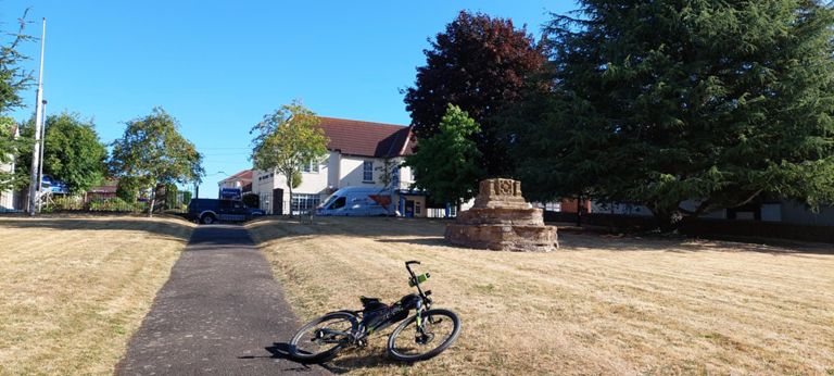 Walnut Tree Hotel in the background