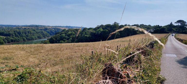 First glimpse of the water of Carrick Roads, River Fal estuary.