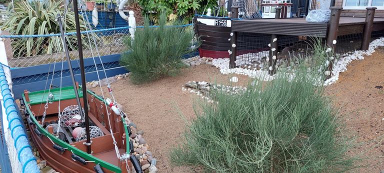 Viewed from the shore line path a little further on.  These houses have Waterside Lane addresses, it being the first road inland from here.