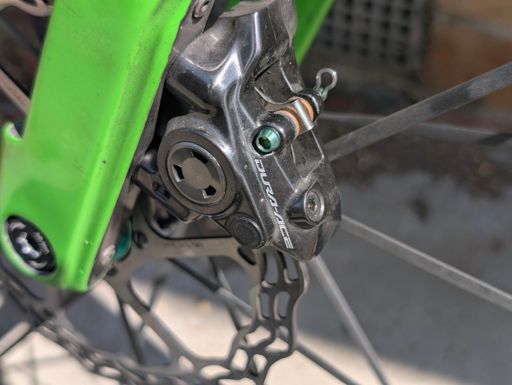 New brake pads fitted...swapped pad pin to titanium.. much better than Shimano Swiss cheese hardness version..