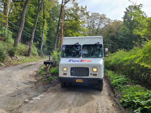 We had to climb into the weeds to get around this Fedex truck, which literally took up the entire one-lane road.  A good reminder to be careful on those descents - you don't know what's around the bend!