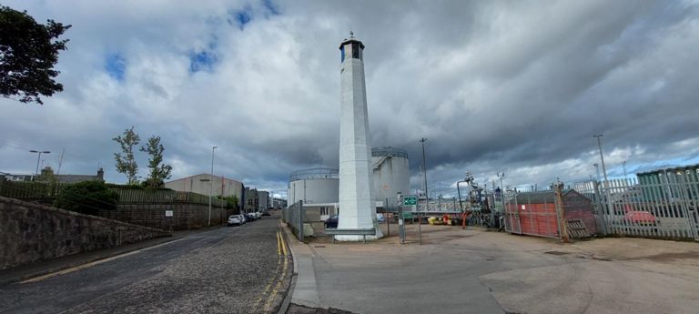Aberdeen's leading lights in continual operation since 1842: Lower leading light in the foreground.  Fascinating Historic Environment Scotland article: https://portal.historicenvironment.scot/designation/LB52520