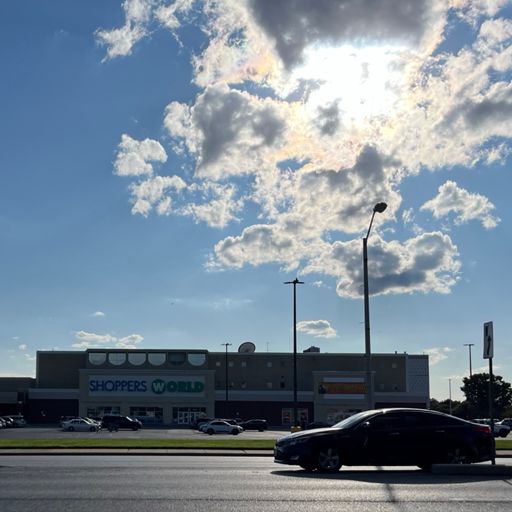 Depressing strip mall, stunning sky