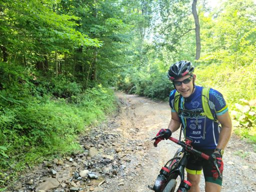 This is a relatively tame picture of the hill that was really rocky, loose, and seriously steep. It was a closed road for a reason... We definitely walked part of this hill and this was very early in our ride