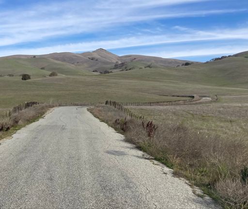 Quien Sabe road, climbs over that ridge