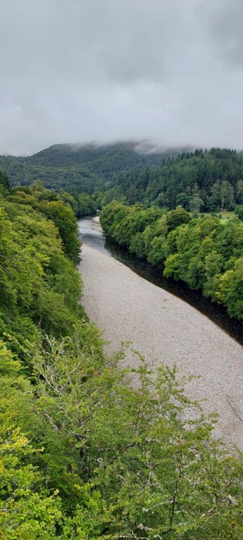 River Garry, 2.5 miles out of Pitlochry. South of here, it joins the River Tummel. With us for many miles as we cycle north, up to Loch Garry just before Drumochter Summit.   The bridge where I took this photograph was just before we joined a General Wade military road route, (Dunkeld to Inverness originally built1728-1730), which I have only just now, In November, realised, as I had wanted to experience one of them!   About River Garry: https://en.wikipedia.org/wiki/River_Garry%2C_Perthshire  About General Wade's military roads: https://en.wikipedia.org/wiki/Military_roads_of_Scotland