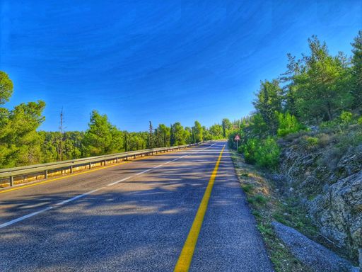 Can you imagine a perfect road surrounded by beautiful nature and nobody to share it with? Some might call it sad but I call it bliss.