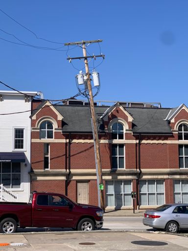Wonder when that will topple over.  I think the city of chagrin Falls named that utility pole Eileen.