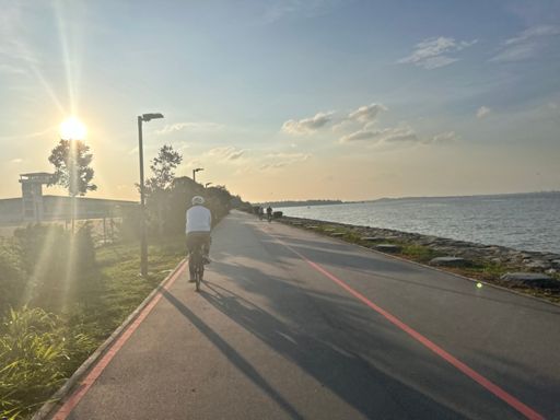 Rising in the sunset. Behind Changi exhibition centre. 