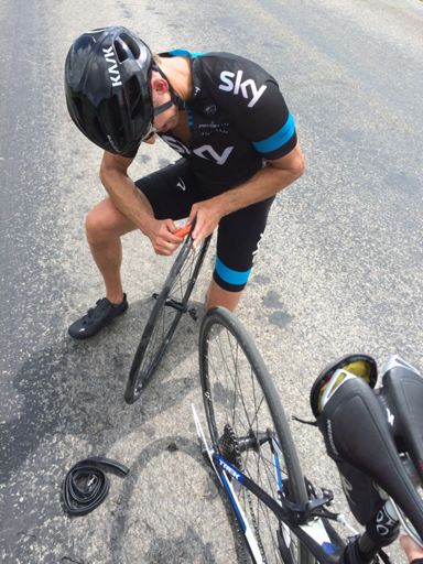Michael fixing his flat pretty fast!