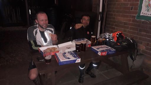 The athletes devour their carefully calculated diet of 4 pizzas and 9 pints