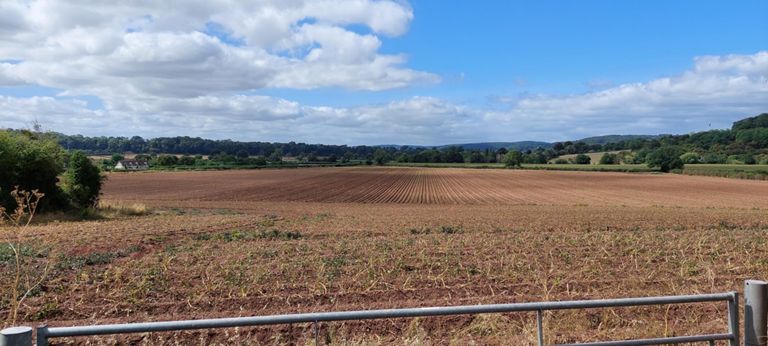 Looking south west from the A417 we were on briefly, roughly opposite Woodhouse Lane, past Bodenham parish hall.   Between there and the Murco petrol station, on the brow of a slight incline over a stream and bend, a reckless fast SUV driver overtook Lorraine by a metre or less, without regard to the oncoming car which ploughed into the hedge to avoid a collision. The driver in front of him was shaken too.