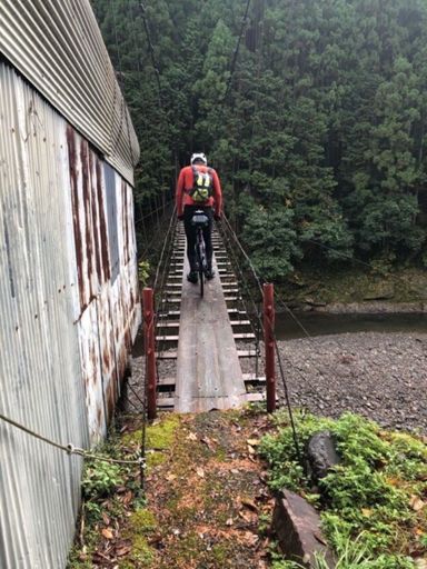 Checking out a rickety suspension bridge.