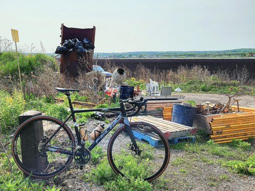 Dumpster Fire of The Marsh but on Gravel