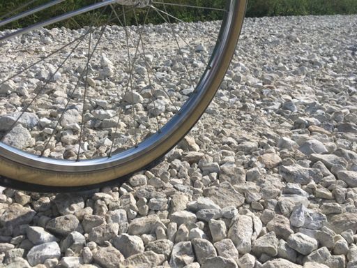 Riding on the stuff throws the bike all over the place. Luckily it was possible with my wife tires. No flats.