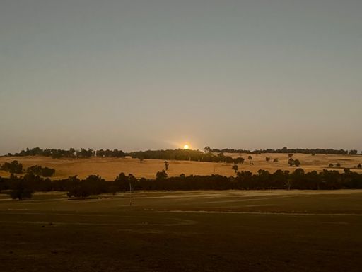 Moon 🌙 coming up over the hills