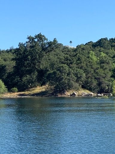 Folsom lake with a view of Eddie Murphys house.