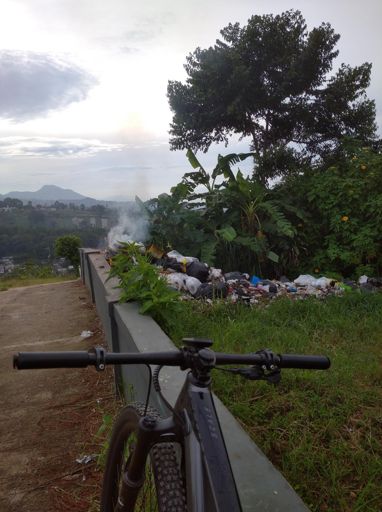 Another pitiful view of scattered thrash (and the burning ashes) 😢