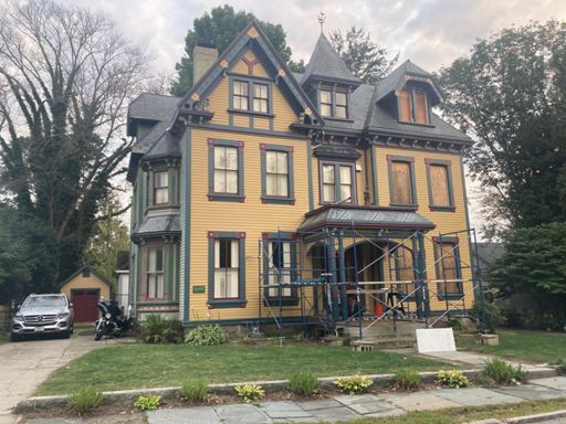 I love Victorian architecture. This and the next are on a street one block over from where I grew up.