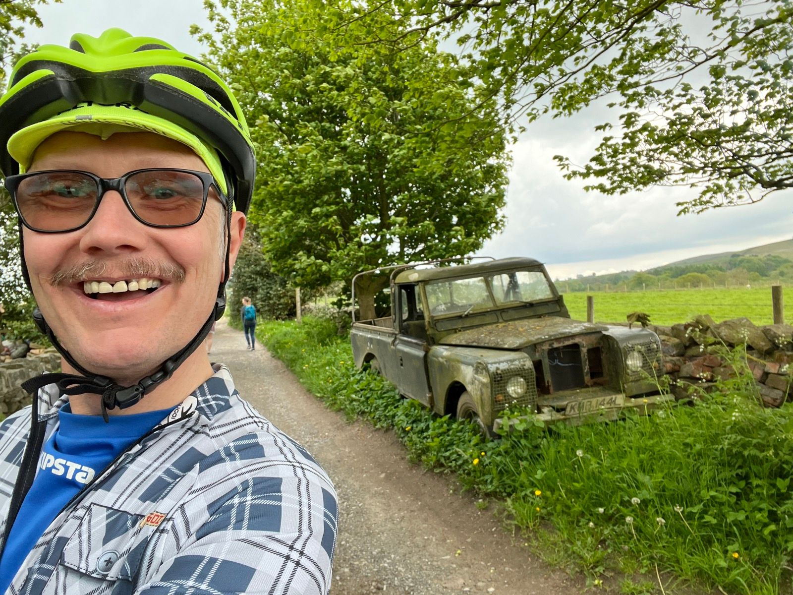 LWB Landrover pickup and an idiot with a moustache