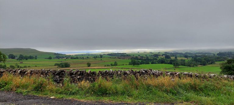 Fast travelling clouds to our right (south east) in the direction of Grimes Moor.  We are less than a mile out of Orton. Our elevation is 300m /984ft.