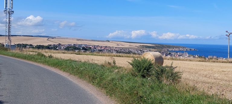 Looking back to Portsoy having climbed a hill.