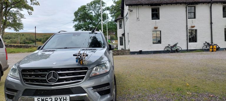 Suction pads keep the fishing lines on tbe car of Ian, David and Ross who are sponsoring us. They overheard me asking the proprietor last night about the history of the hotel and we got talking.  After our meals, we talked again and they kindly donated.  This morning, David Sutherland, whom we have nick-named Dave the Save(ior), gave Lorraine one of his midge nets.  She has one at home alas.