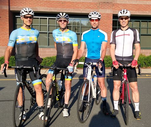 The winning team pre-ride, when I could still smile without cramping...