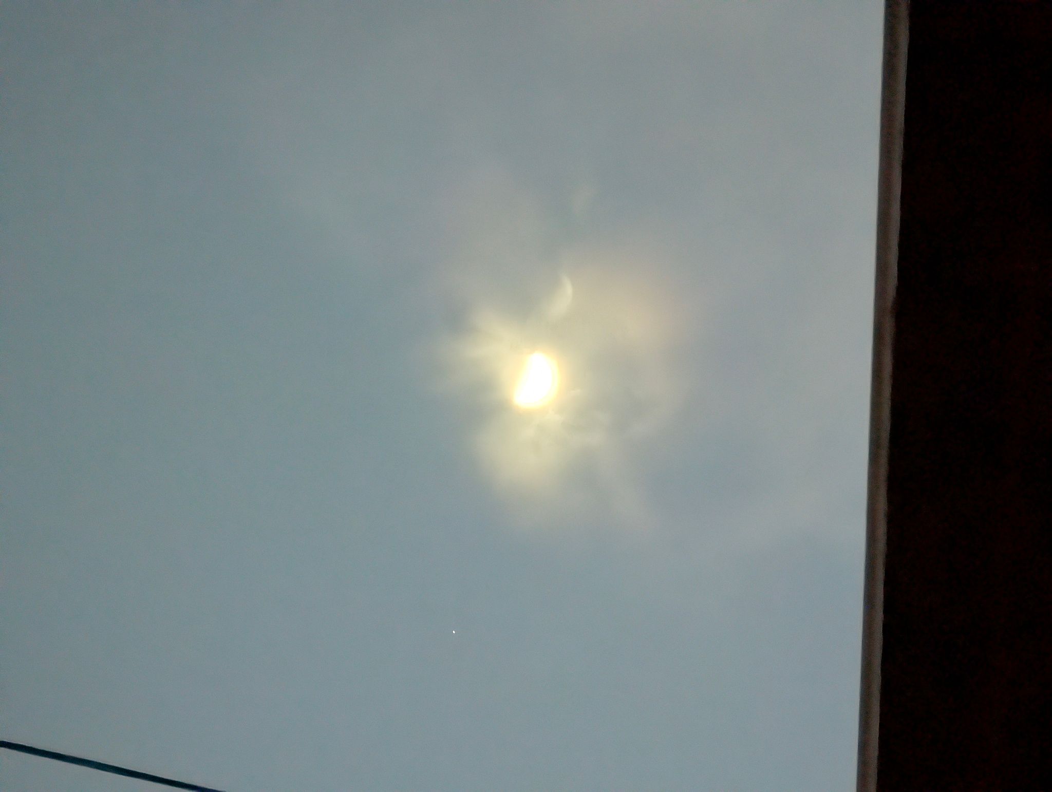 Attempted photo of waxing half moon at zenith.  The big bright blob is actually the moon.