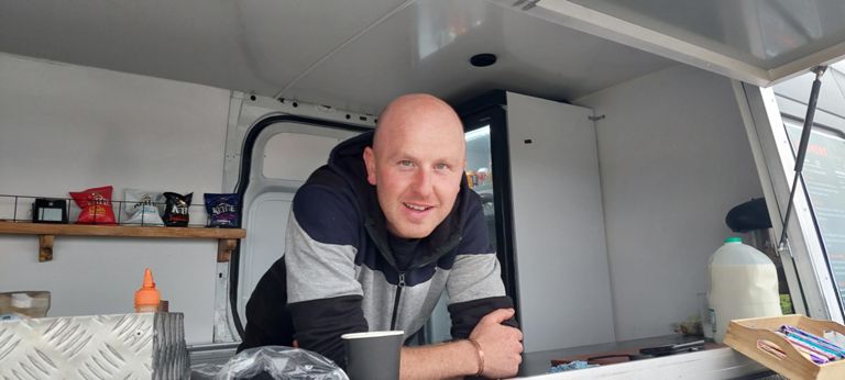 Oliver has been running his fast food van for 2 months. Formerly a roofer and builder. Oliver supported me with his lively positive outlook and by donating coffee and 2 Booster bars, so I will add the equivalent to the fund.