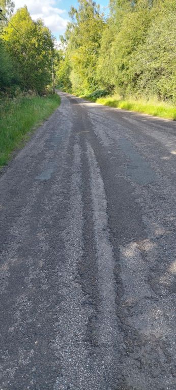 B864. Many Scottish B and some A roads are like this: they've lost the top layer binder smoothing out the surface, so there is either a constant change or just relentless hammering over stones.