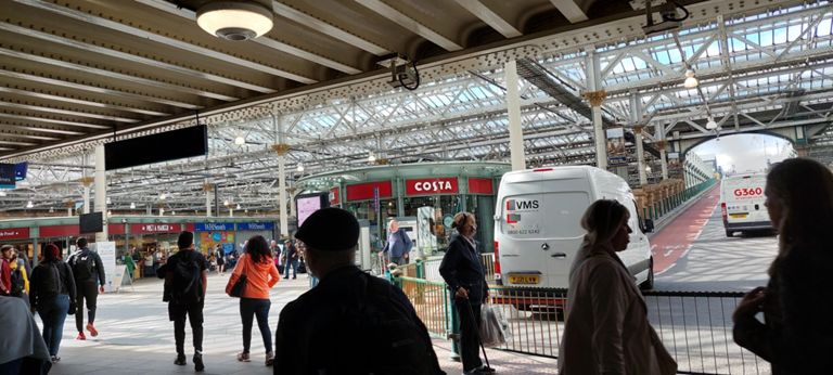 Edinburgh Waverley railway station. Network Rail's website has a great aerial photo, showing its size: https://www.networkrail.co.uk/communities/passengers/our-stations/edinburgh-waverley/