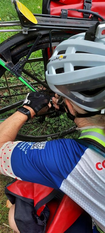 It was at this point, on the 11th day of using the road bicycles, that Lorraine's pannier's bottom stay came loose and she made a repair.