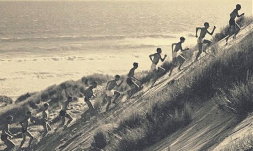 Percy Cerutty leads his athletes up a Portsea sand dune.
