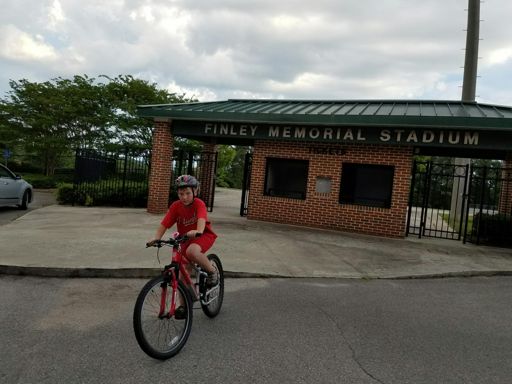 Josiah leaving the stadium on our ride home.